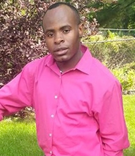 man wearing pink long sleeves in the garden